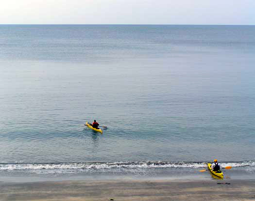 Alan and Steve Kayaking to Maziwi Island