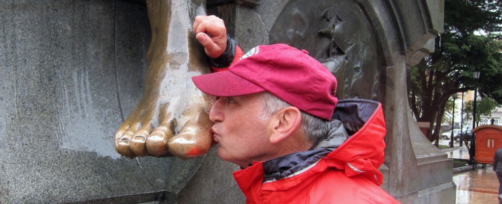 Alan Feldstein Kissing the Foot of Native Indian Statue - Punta Arenas Chile